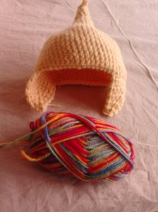 hat and coloured yarn